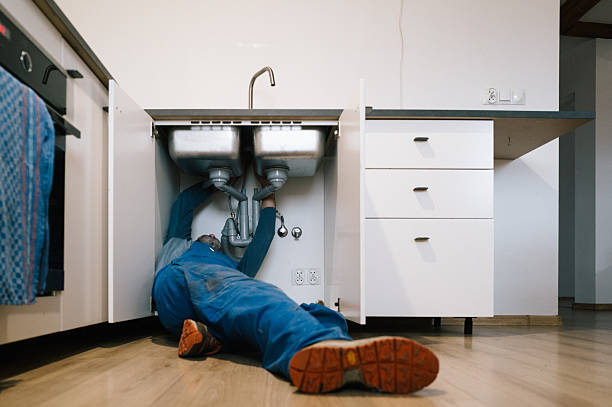 Professional Emergency Plumber technician working in Silverton, OH